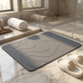Livora stone bath mat on a spa bathroom floor
