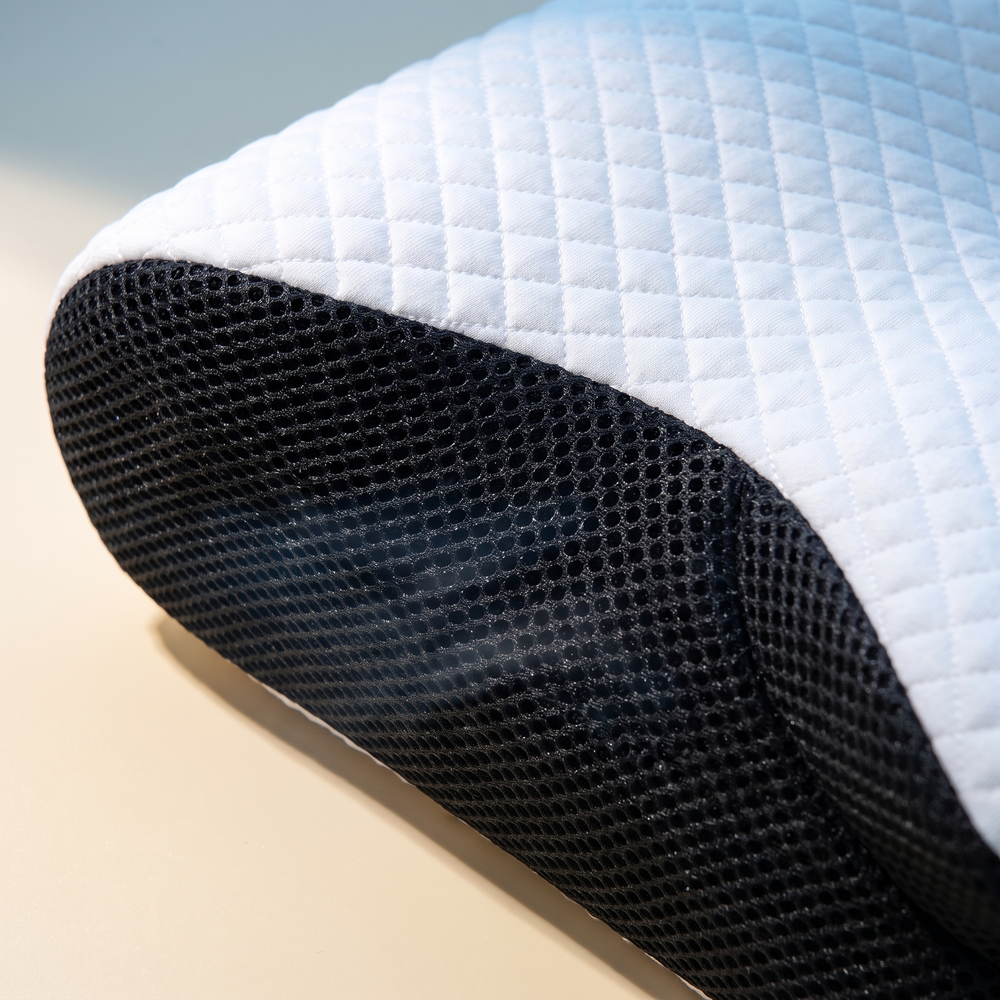 Closeup of breathable quilted cover and cooling air-mesh side panel